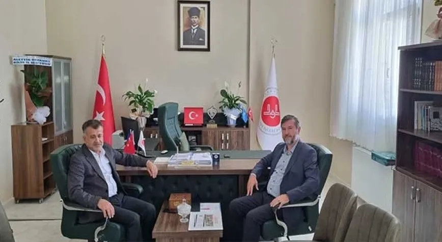 BAŞKAN  HACIOĞLU' NDAN NEZAKET ZİYARETİ