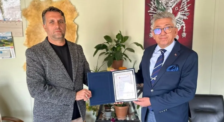 Muhtar Riyat Tecimen’e teşekkür belgesi