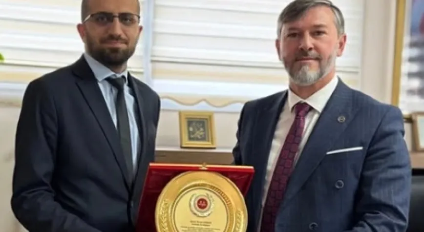 NECAT ŞİMŞEK’E PLAKET
