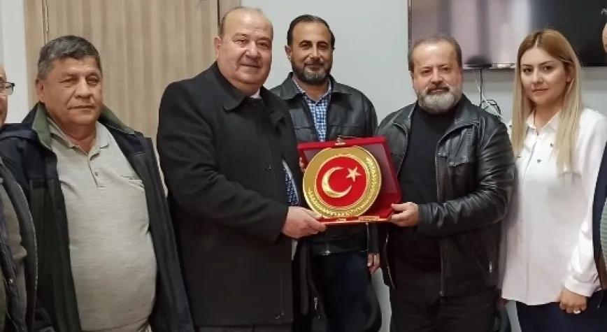 Şahutoğlu’na Eğitime Katkı Plaketi