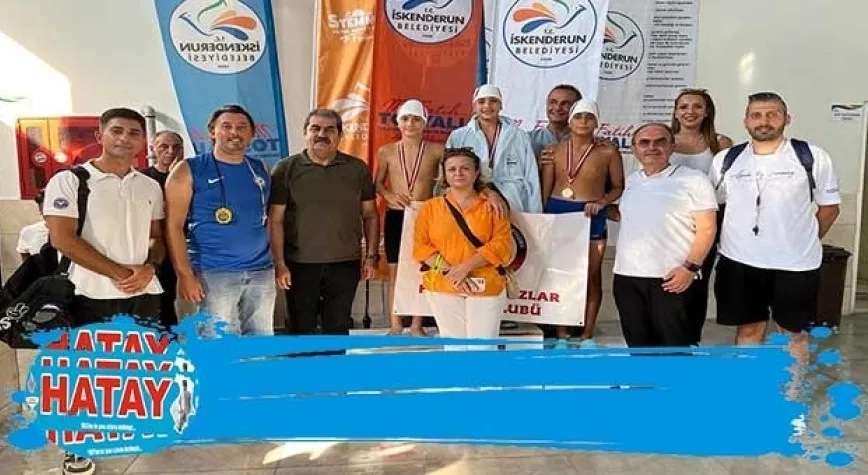 YÜZME YARIŞINDA DERECEYE GİRENLERE ÖDÜLLERİ  VERİLDİ